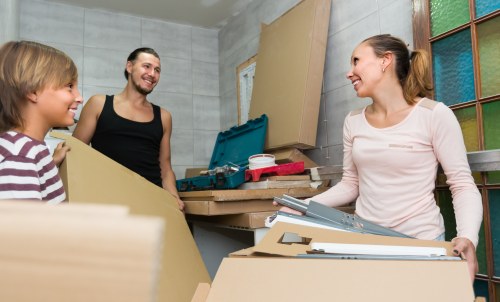 Student removals team loading boxes and furniture in Colliers Wood