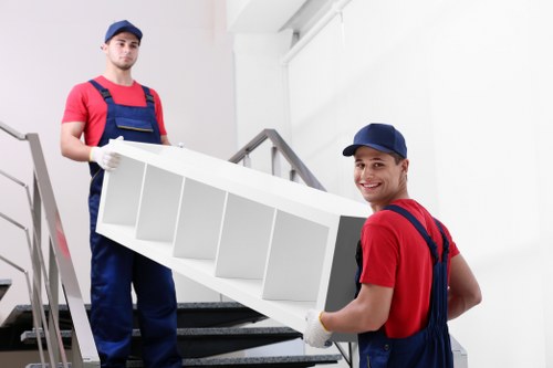 Furniture removal team handling a home move in Colliers Wood