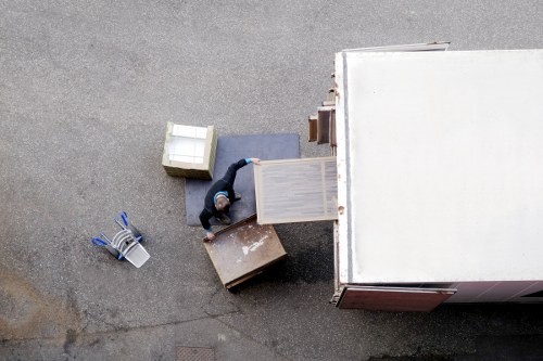 Packed office boxes and workspace equipment prepared for relocation