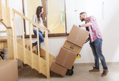 Office furniture and desks being prepared for relocation