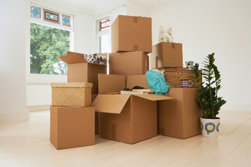 Packing and loading household items for a Colliers Wood removal