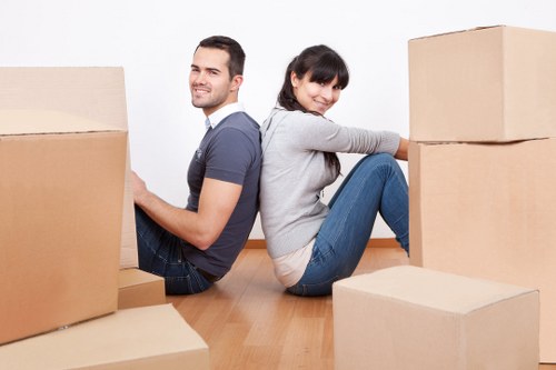Removal van and moving boxes for a Colliers Wood property